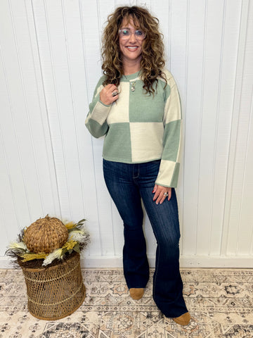 Check Out The Trendy Sweater